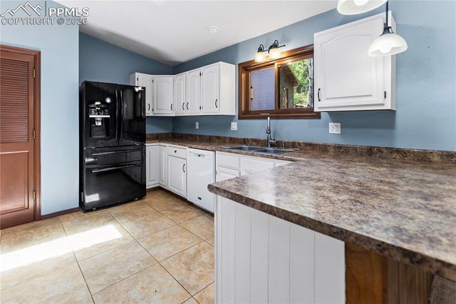 1129 Forest Hill Road, Woodland Park, CO 80863