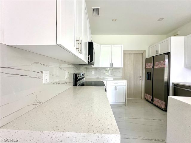 418 Wellington AVE, Lehigh Acres, FL 33972