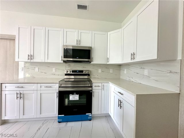 418 Wellington AVE, Lehigh Acres, FL 33972