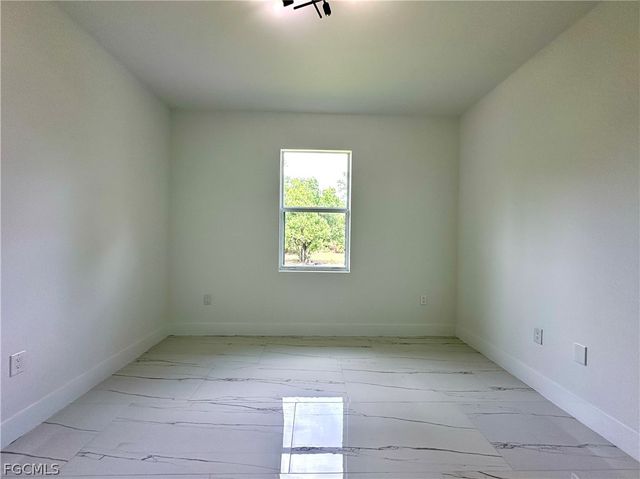 418 Wellington AVE, Lehigh Acres, FL 33972