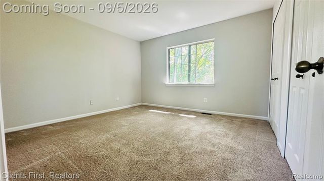 597 Winwood Circle, Walled Lake, MI 48390