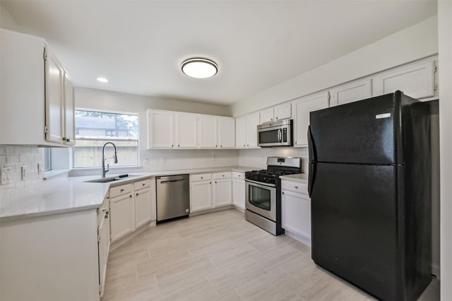 9202 Bayou Bluff Drive, Spring, TX 77379