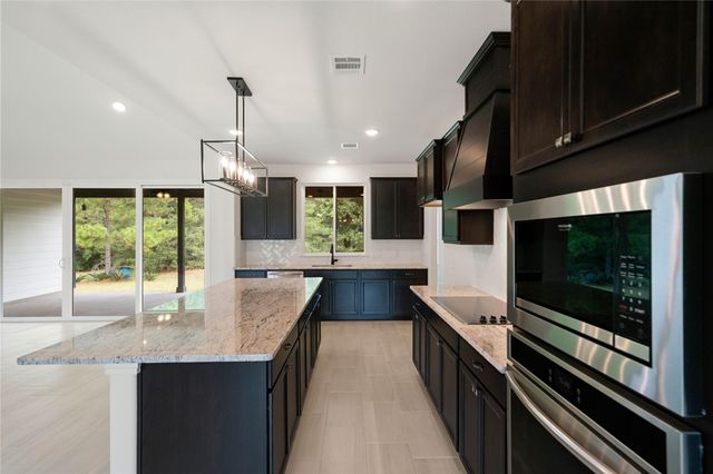 21203 Peach Wood Court, Cleveland, TX 77328
