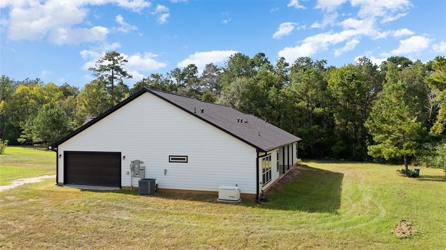 21203 Peach Wood Court, Cleveland, TX 77328