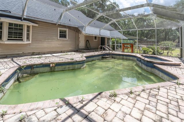 10422 N WOODMERE ROAD, Tampa, FL 33617