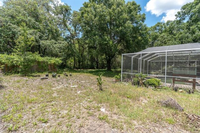 10422 N WOODMERE ROAD, Tampa, FL 33617