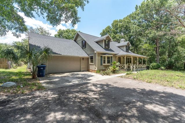 10422 N WOODMERE ROAD, Tampa, FL 33617