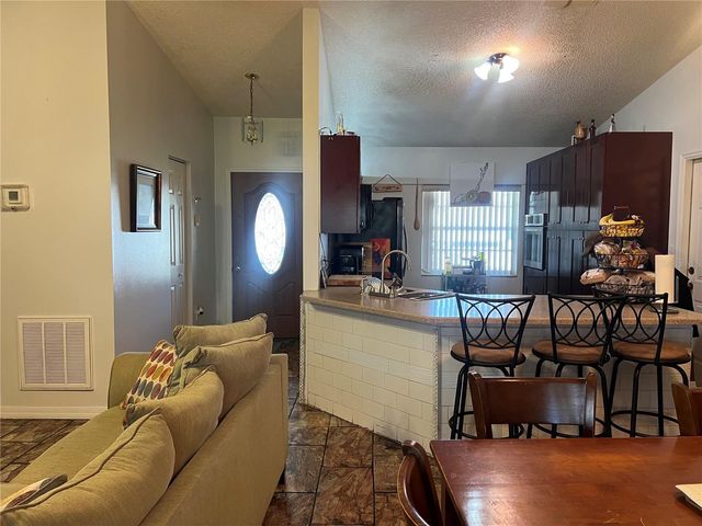 910 LOUVRE COURT, Kissimmee, FL 34759