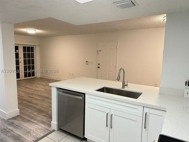5001 Wiles Rd 207, Coconut Creek, FL 33073