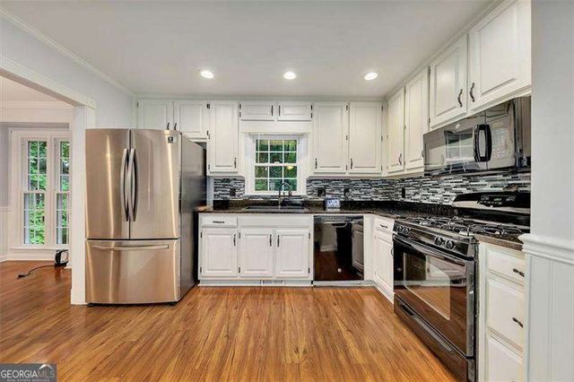 718 PLAYERS Court, Woodstock, GA 30189