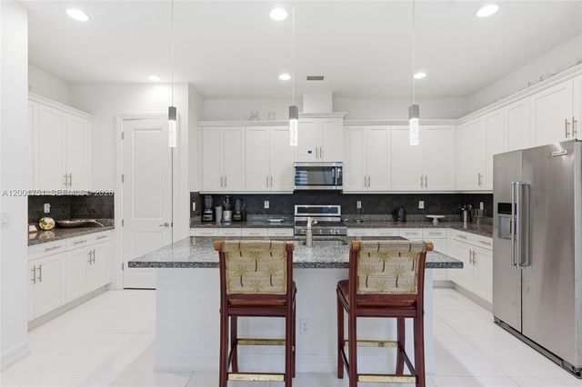 9220 E Meridian Dr, Parkland, FL 33076