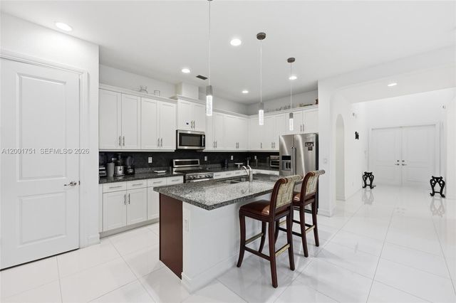 9220 E Meridian Dr, Parkland, FL 33076
