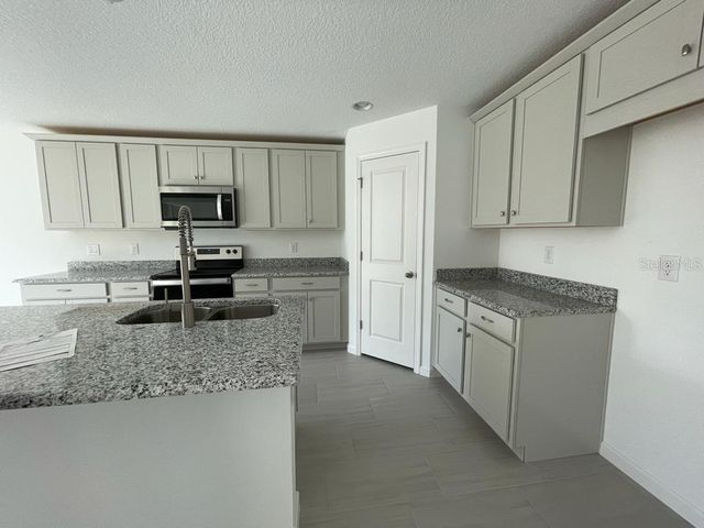1186 TUPELO TRAIL, Haines City, FL 33844