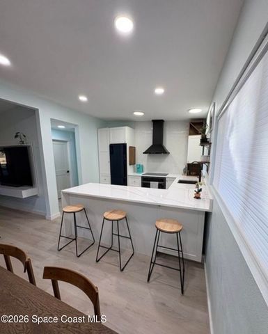 7705 Poinsetta Avenue, Cape Canaveral, FL 32920