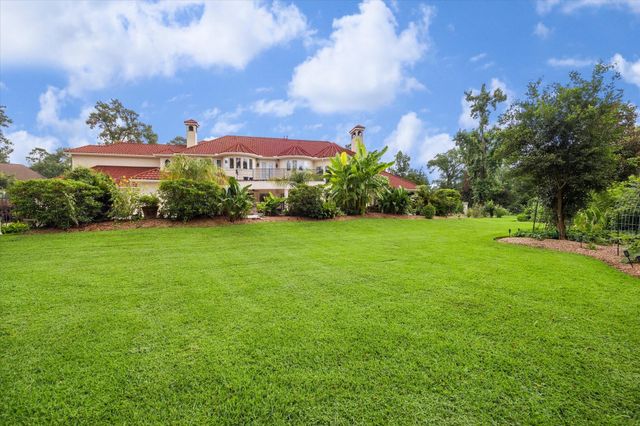 6 Kings Lake Estates Boulevard, Kingwood, TX 77346