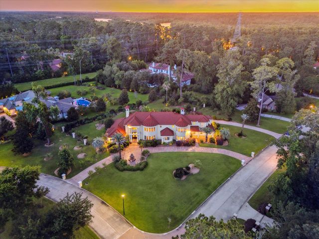 6 Kings Lake Estates Boulevard, Kingwood, TX 77346