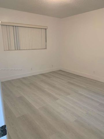 5003 NW 35th Street 405, Lauderdale Lakes, FL 33319