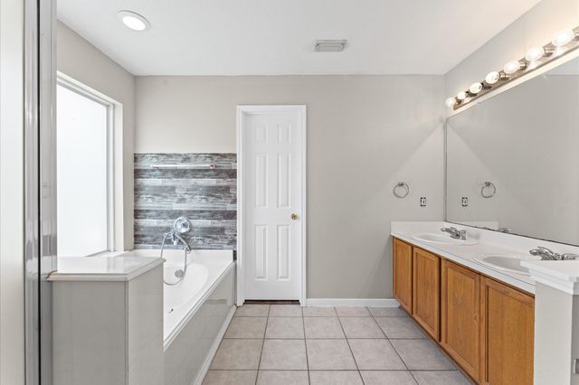 11819 S Brenton Knoll Drive, Tomball, TX 77375