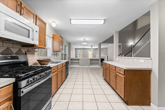 11819 S Brenton Knoll Drive, Tomball, TX 77375