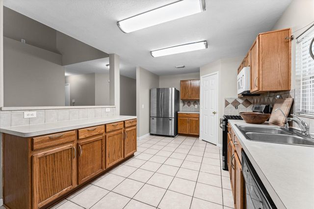 11819 S Brenton Knoll Drive, Tomball, TX 77375