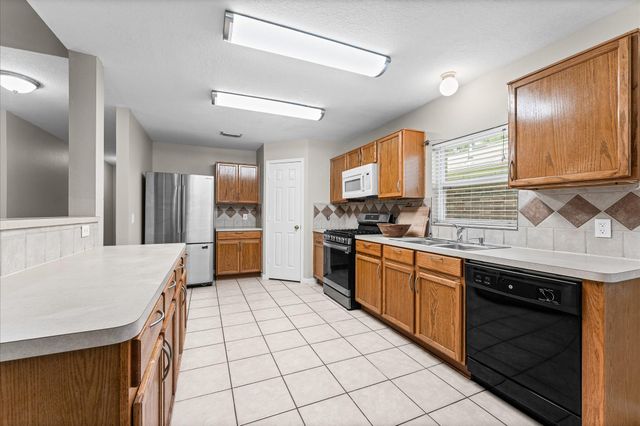 11819 S Brenton Knoll Drive, Tomball, TX 77375