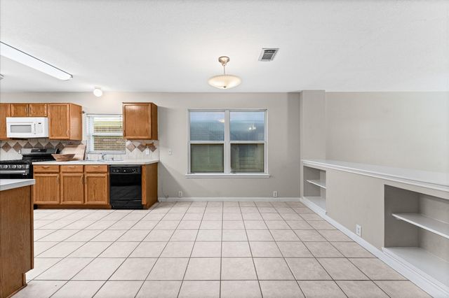 11819 S Brenton Knoll Drive, Tomball, TX 77375