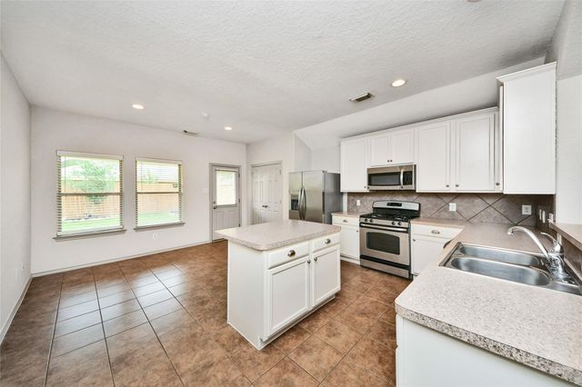 26131 Travis Brook Drive, Richmond, TX 77406