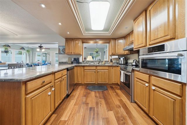 7712 LAKESIDE WOODLANDS, Hudson, FL 34667