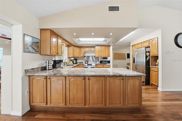 7712 LAKESIDE WOODLANDS, Hudson, FL 34667