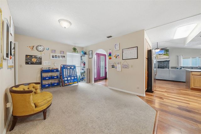 7712 LAKESIDE WOODLANDS, Hudson, FL 34667