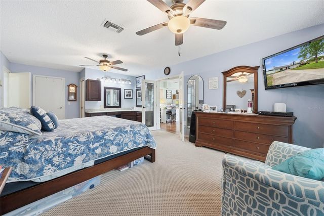 7712 LAKESIDE WOODLANDS, Hudson, FL 34667