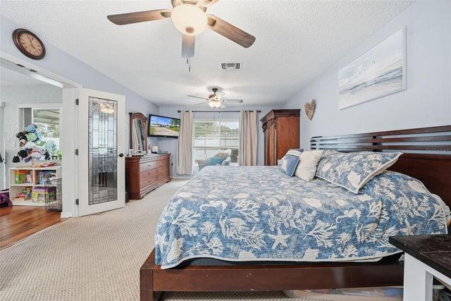 7712 LAKESIDE WOODLANDS, Hudson, FL 34667