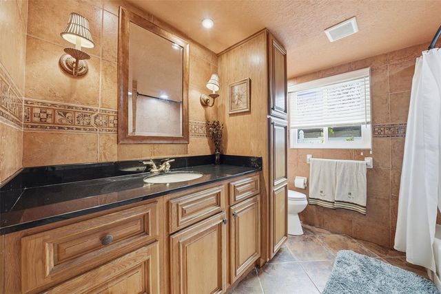 7712 LAKESIDE WOODLANDS, Hudson, FL 34667