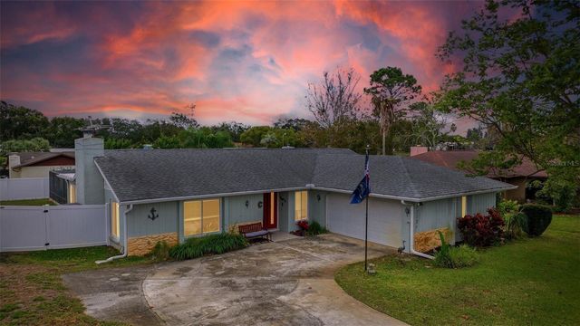 7712 LAKESIDE WOODLANDS, Hudson, FL 34667