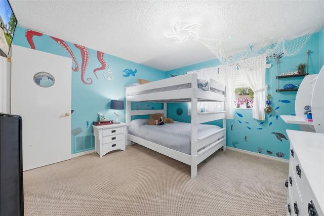 7712 LAKESIDE WOODLANDS, Hudson, FL 34667