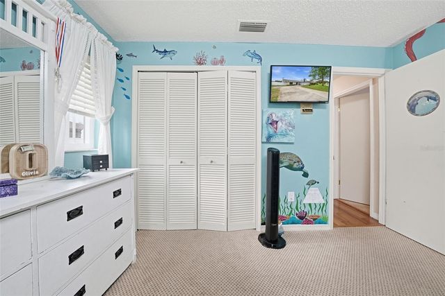 7712 LAKESIDE WOODLANDS, Hudson, FL 34667