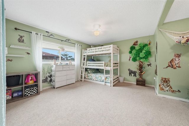 7712 LAKESIDE WOODLANDS, Hudson, FL 34667