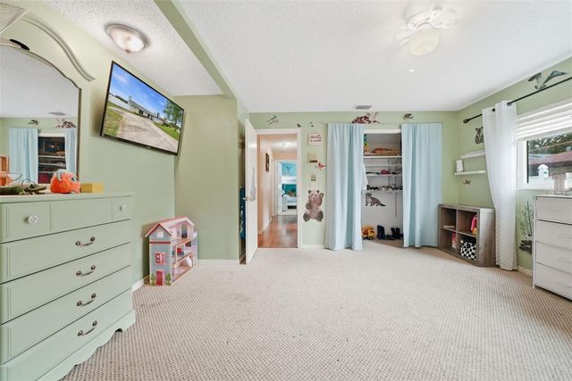 7712 LAKESIDE WOODLANDS, Hudson, FL 34667