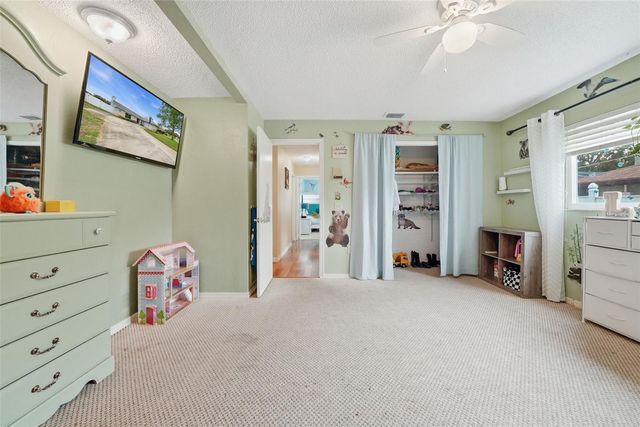 7712 LAKESIDE WOODLANDS, Hudson, FL 34667