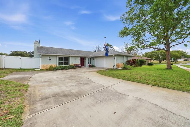 7712 LAKESIDE WOODLANDS, Hudson, FL 34667