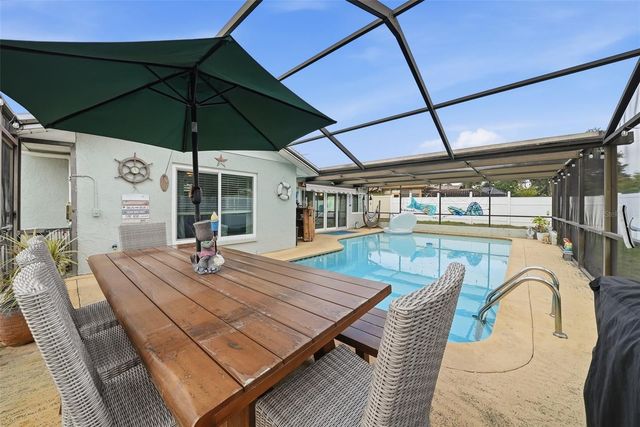 7712 LAKESIDE WOODLANDS, Hudson, FL 34667