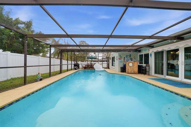 7712 LAKESIDE WOODLANDS, Hudson, FL 34667