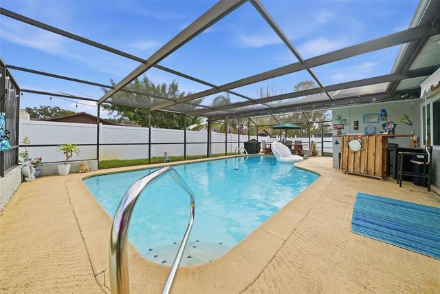 7712 LAKESIDE WOODLANDS, Hudson, FL 34667