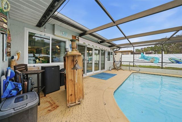 7712 LAKESIDE WOODLANDS, Hudson, FL 34667