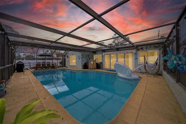 7712 LAKESIDE WOODLANDS, Hudson, FL 34667