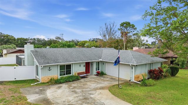 7712 LAKESIDE WOODLANDS, Hudson, FL 34667