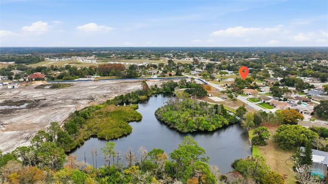 7712 LAKESIDE WOODLANDS, Hudson, FL 34667