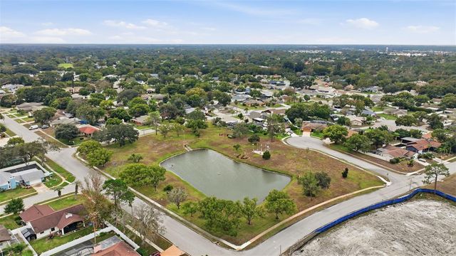 7712 LAKESIDE WOODLANDS, Hudson, FL 34667