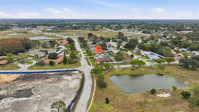 7712 LAKESIDE WOODLANDS, Hudson, FL 34667