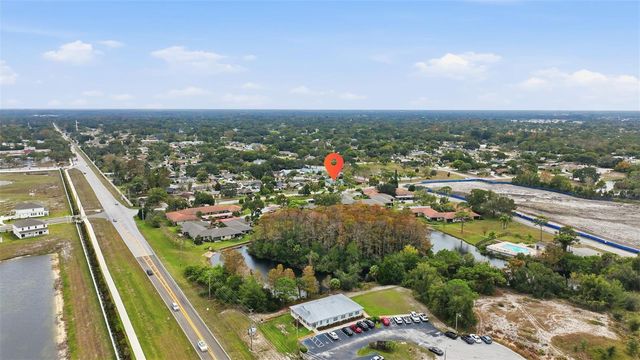 7712 LAKESIDE WOODLANDS, Hudson, FL 34667